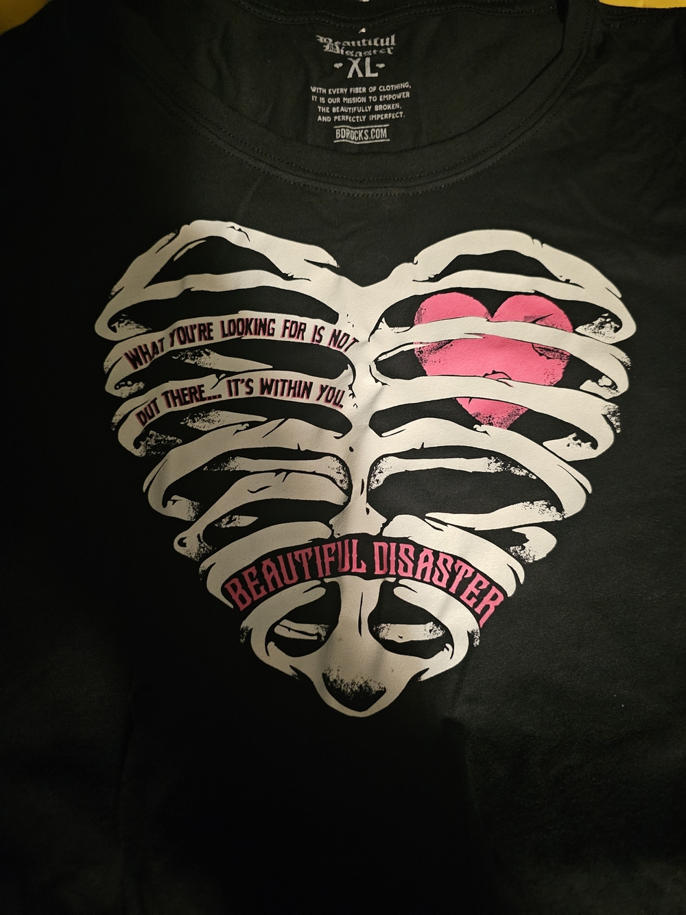 Beautiful Disaster Women's Black Short Sleeve Graphic Tee - Pink Heart Rib Cage
